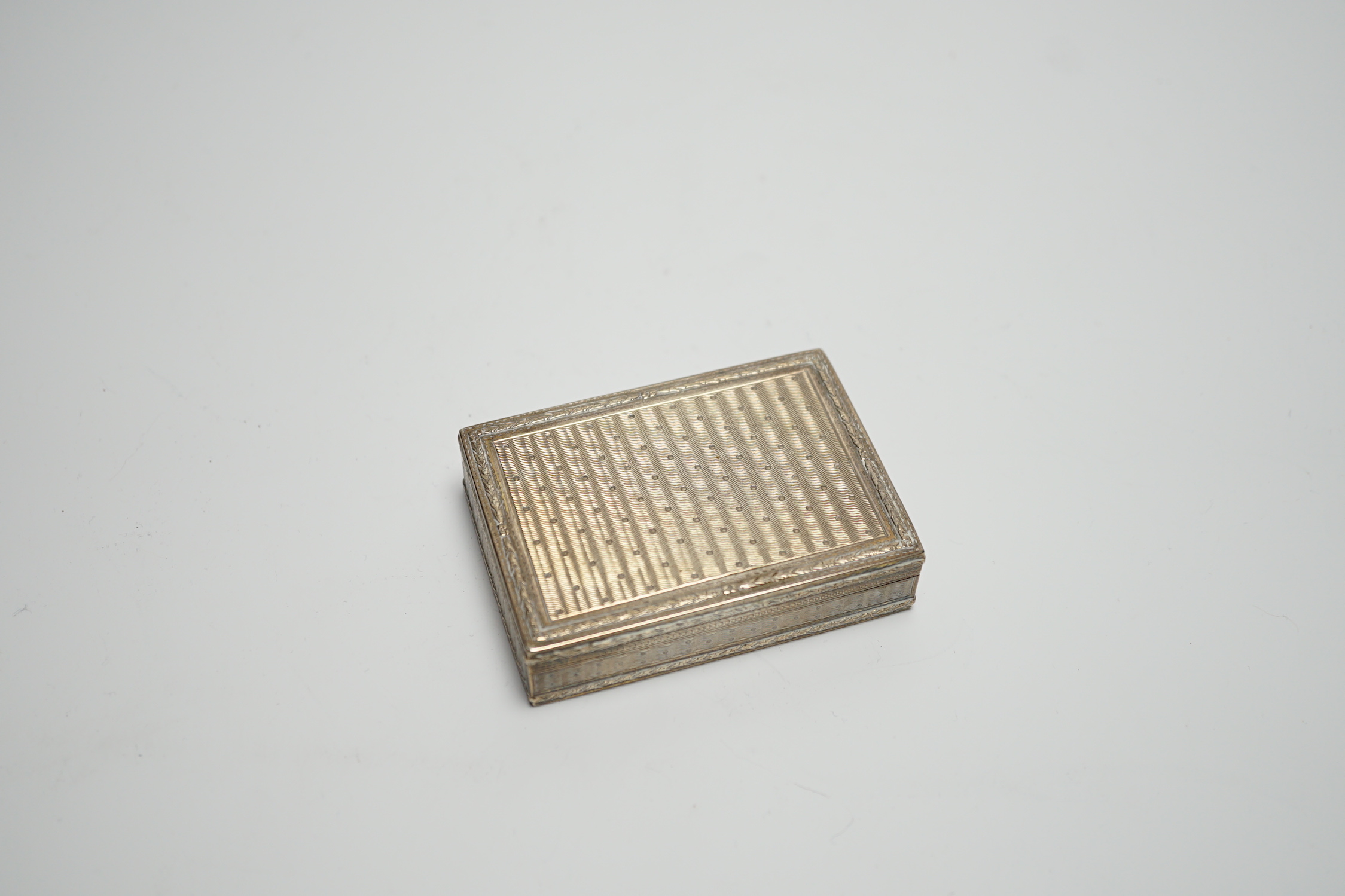 A late 19th century continental engine turned silver rectangular snuff box, import marks for Edwin Thompson Bryant, London, 1897, 78mm.